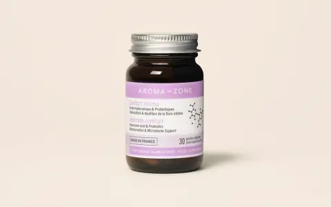 Flacon de compléments alimentaires Aroma-Zone pour le confort intime, contenant acide hyaluronique et probiotiques vaginaux.