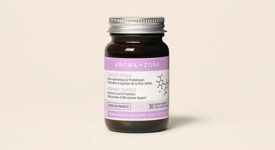 Flacon de compléments alimentaires Aroma-Zone pour le confort intime, contenant acide hyaluronique et probiotiques vaginaux.